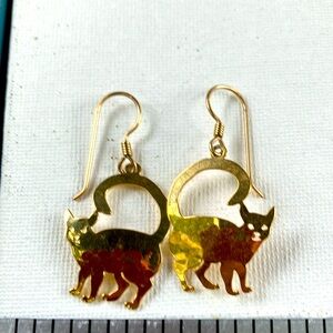 Wild Byrd gold tone cat with long tail dangle earrings